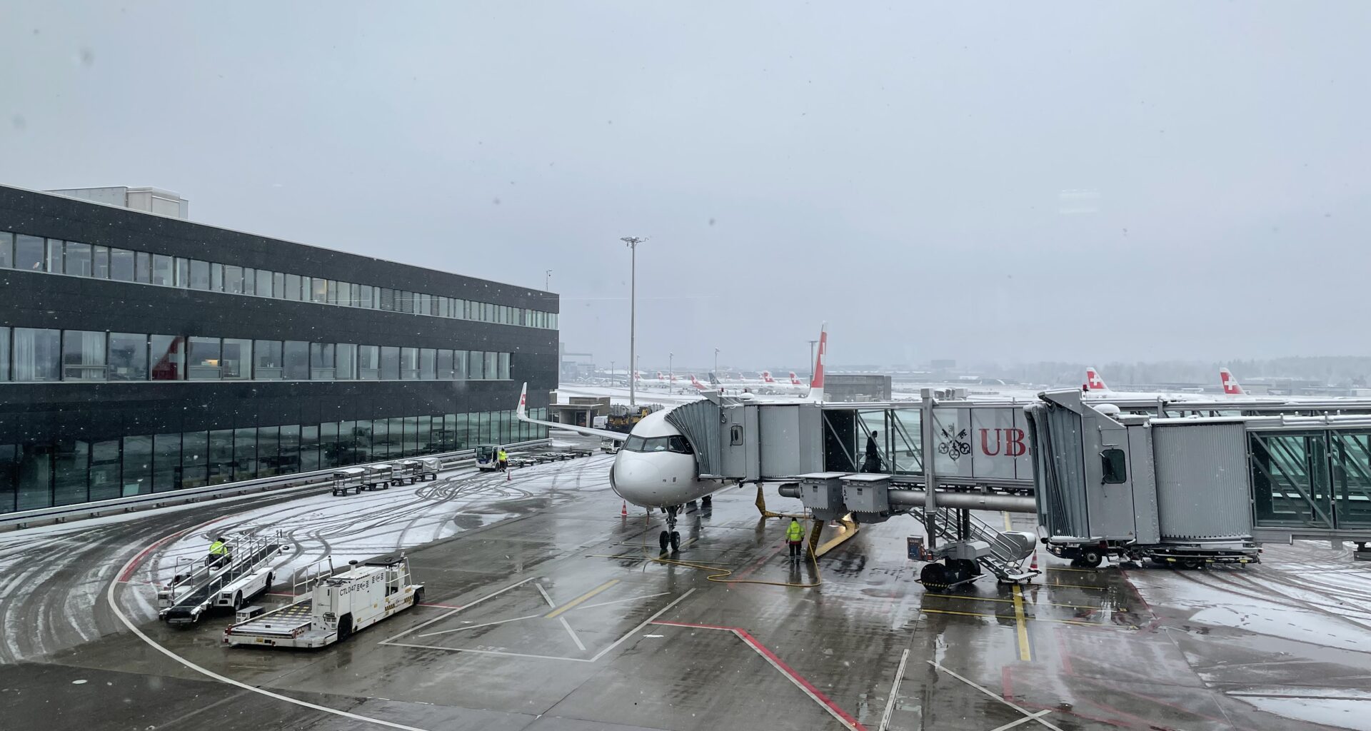 an airplane on a tarmac at an airport