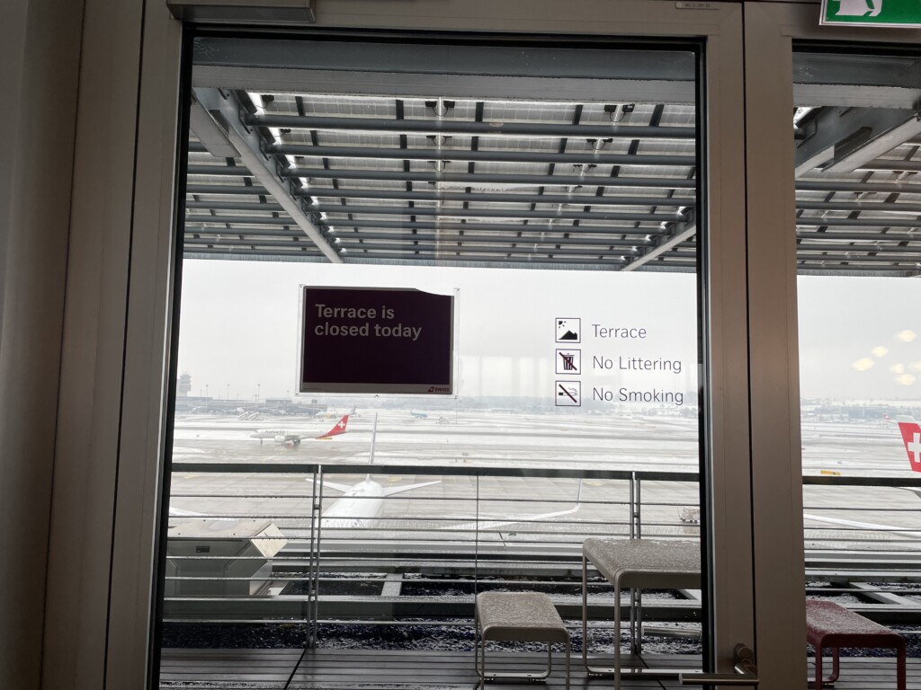 a glass door with a sign on it