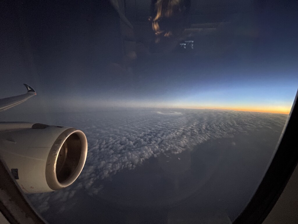 an airplane wing and the sky