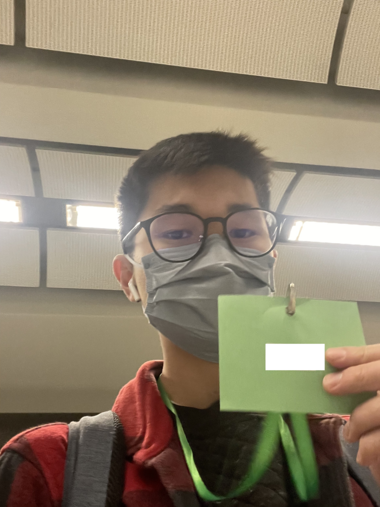 a boy wearing a mask and glasses