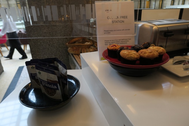 a plate of muffins and a bowl of cereals