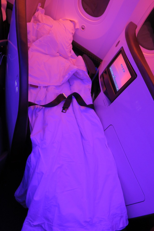 a bed in a plane