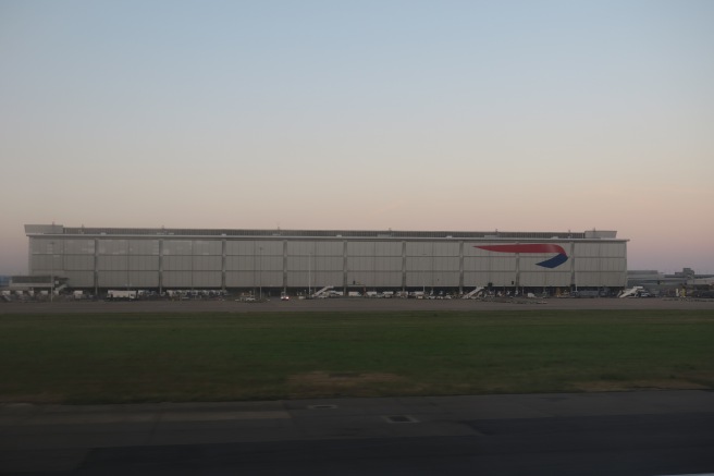 a large building with a red and blue logo