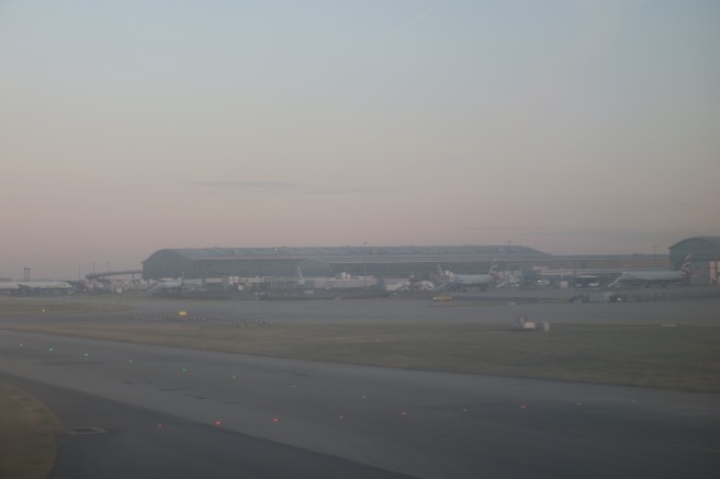 a runway with airplanes on it