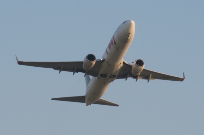 a plane flying in the sky