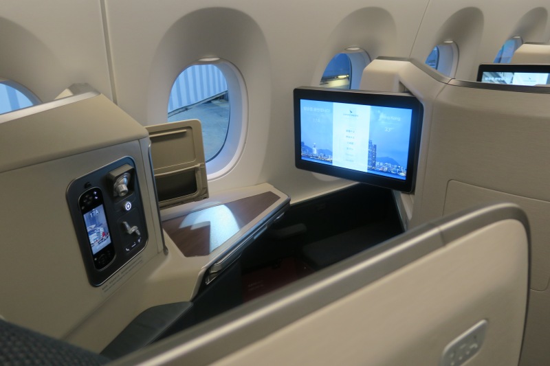 a tv and screen in an airplane