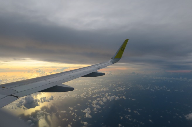 an airplane wing in the sky