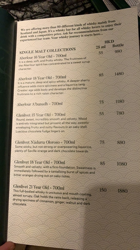 a menu of alcohol with numbers and text