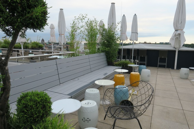 a bench and table on a patio