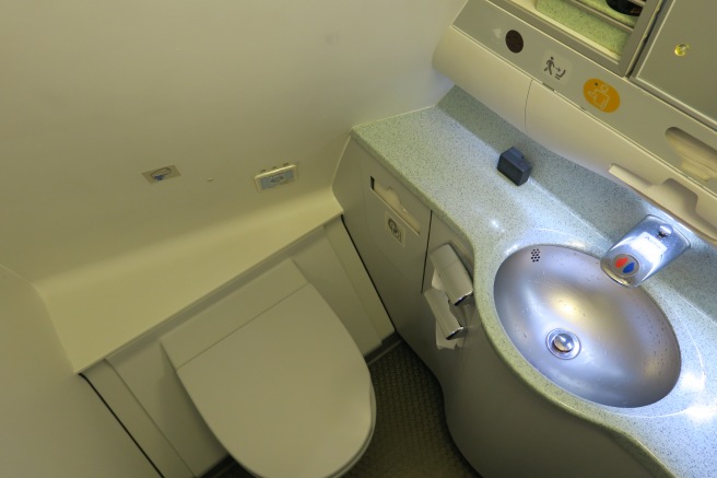 a sink and toilet in a bathroom