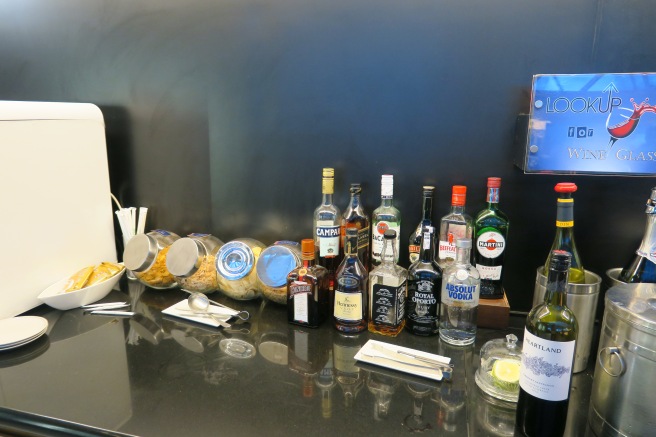 a group of bottles of alcohol on a counter