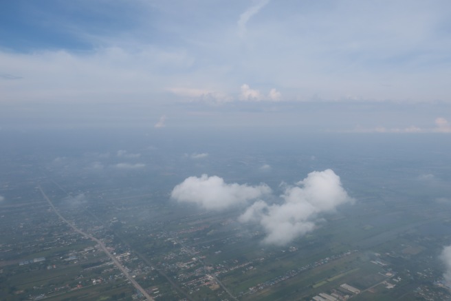 aerial view of a city and clouds