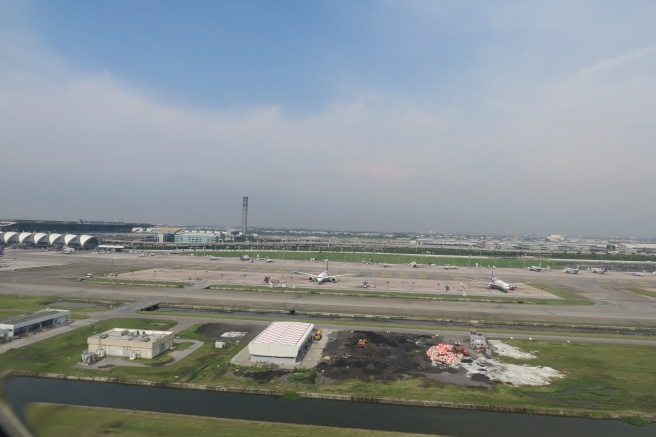 an airport with planes on the runway