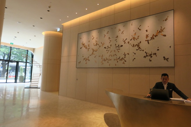 a man sitting at a reception desk