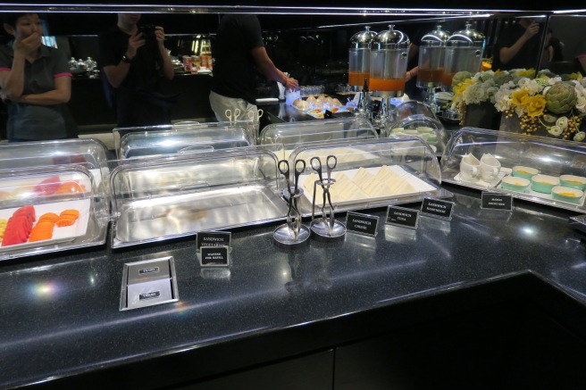 a buffet table with food items