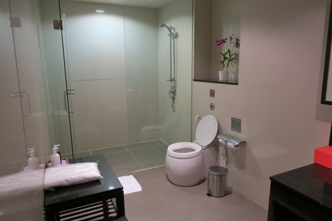 a bathroom with a glass shower