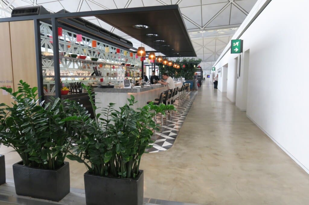 a man sitting at a counter in a building