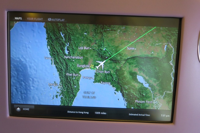 a screen with a map and a plane flying