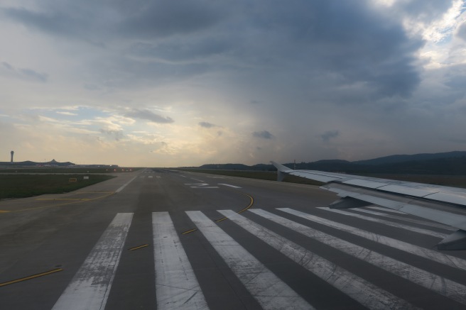 an airplane wing on a runway