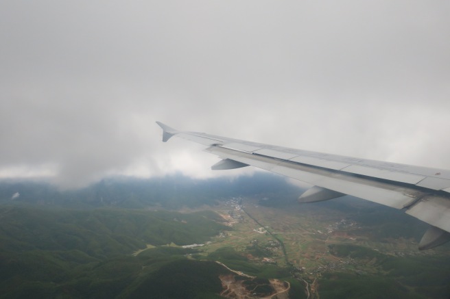 an airplane wing in the sky