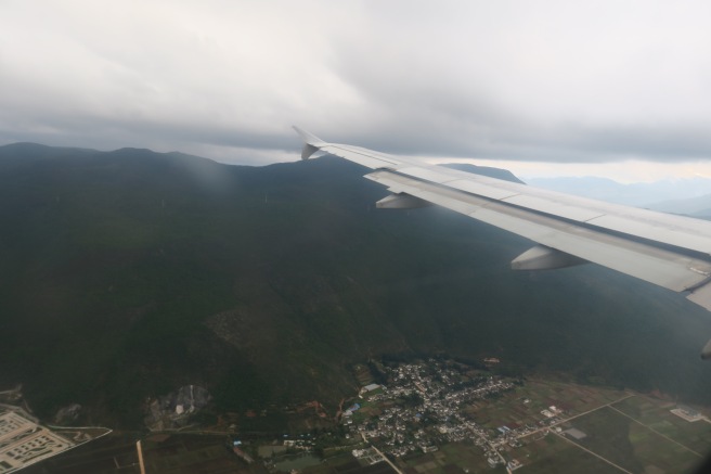 an airplane wing in the sky