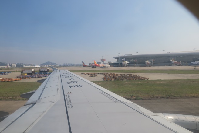 an airplane wing on a runway