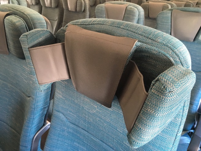 a seat with a pocket attached to it