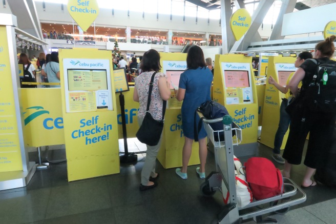 people standing in a terminal