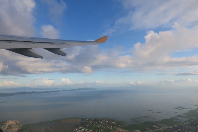 an airplane wing above water