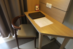 a chair and a laptop on a desk