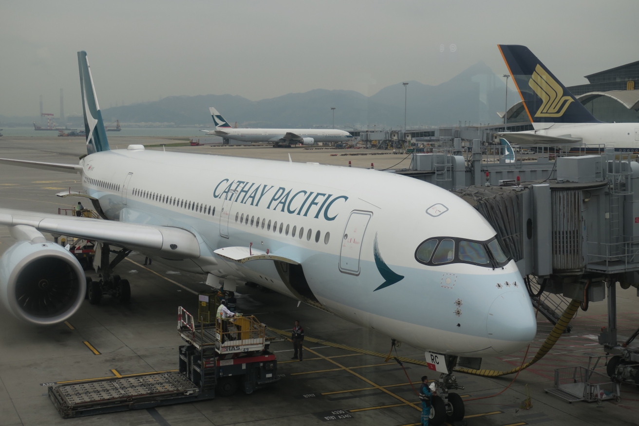 a large white airplane at an airport