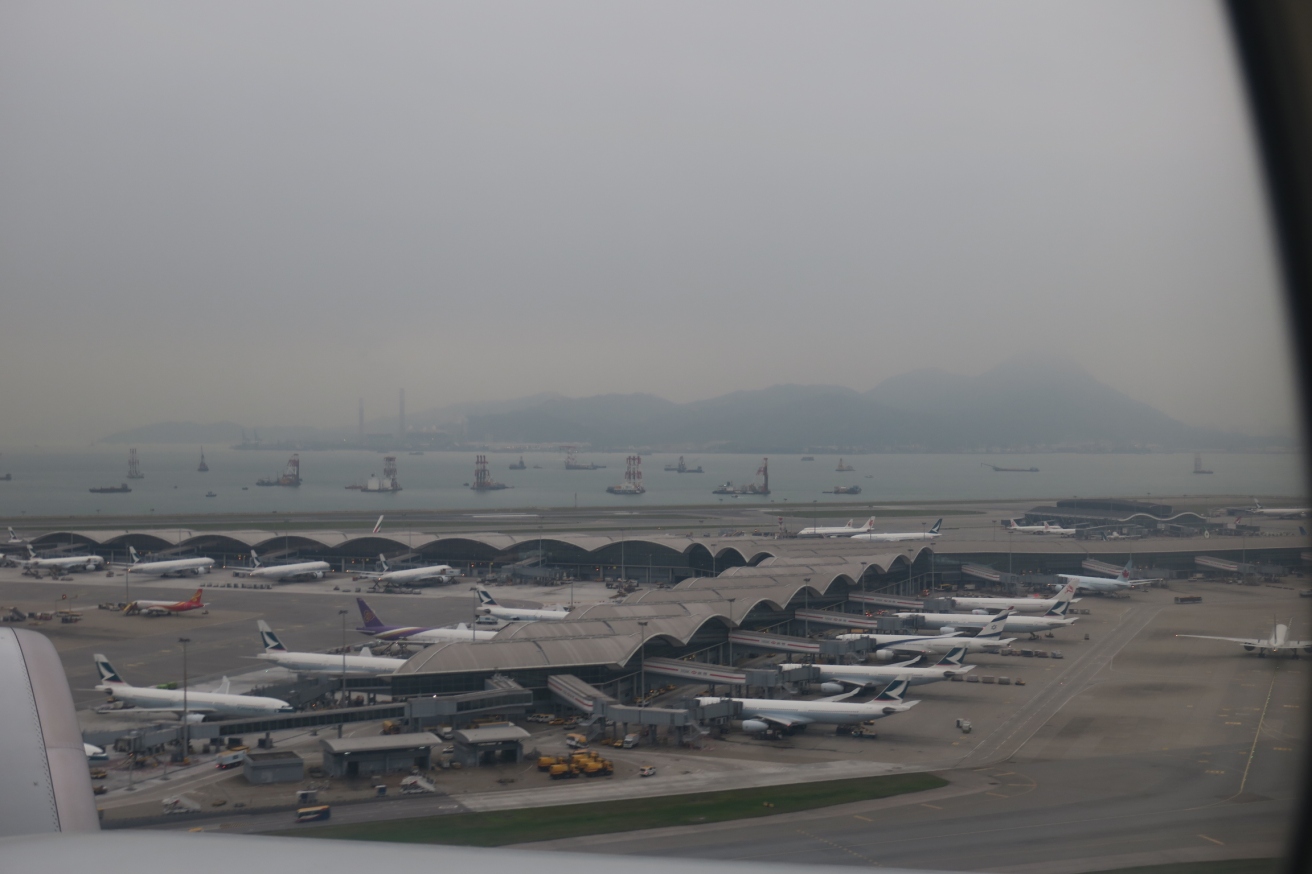 an airport with airplanes parked on the ground