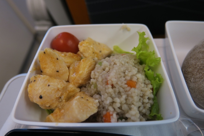 a bowl of food on a tray