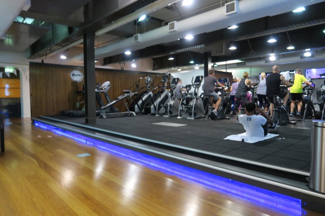 a group of people in a gym