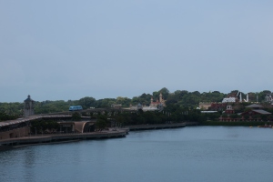 a body of water with buildings and trees