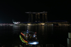 a boat in the water at night