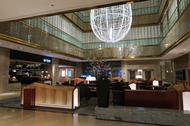 a large chandelier in a hotel lobby