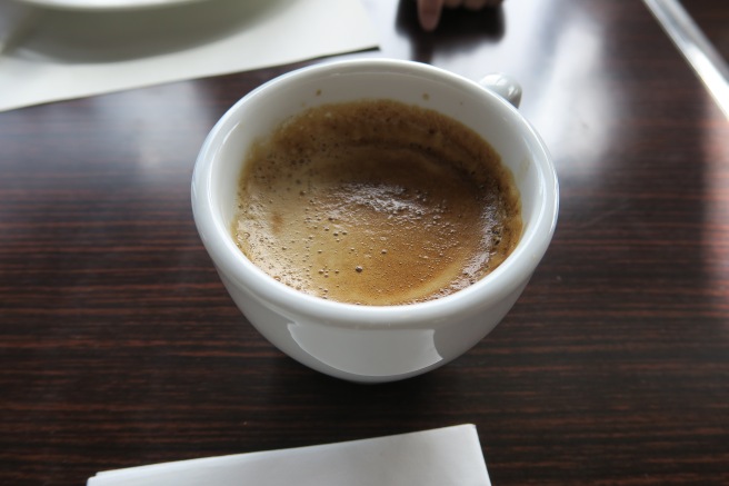 a cup of coffee on a table