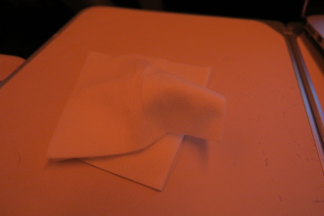 a white napkin on a white surface