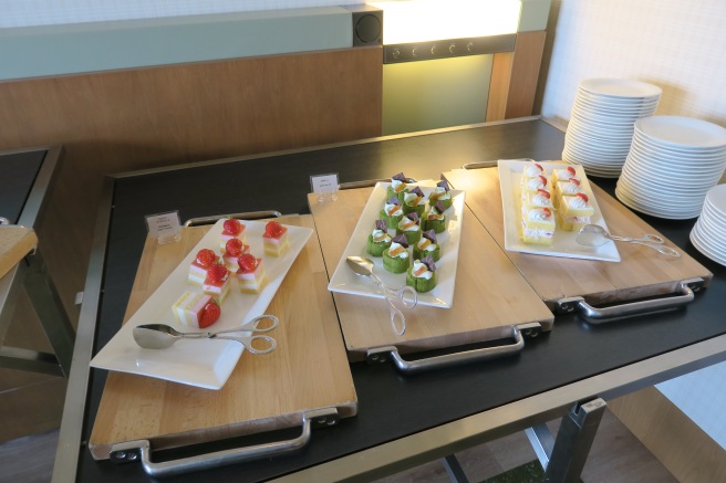 a trays of desserts on a table