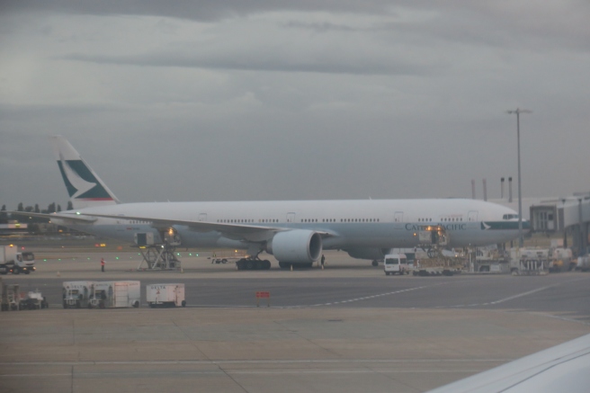 a large white airplane on a runway