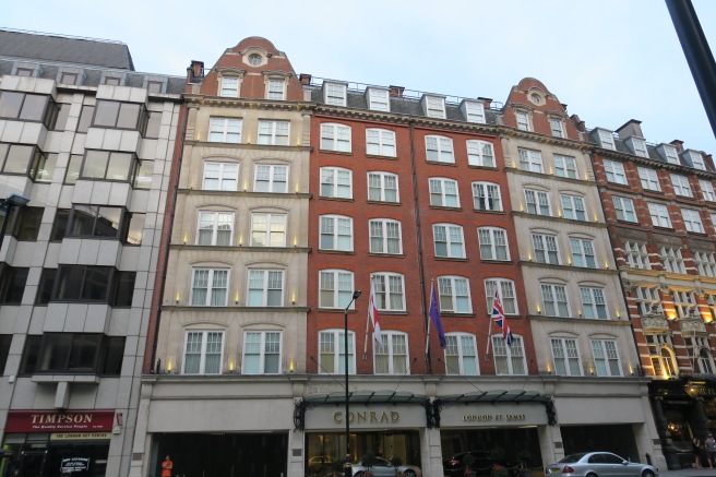 a building with flags on the front