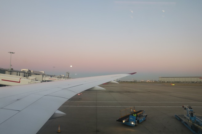 an airplane wing on a runway