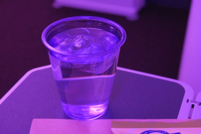 a glass of water on a table