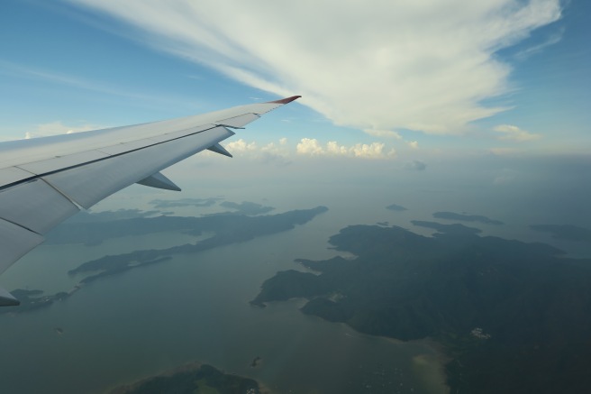 an airplane wing and land in the sky