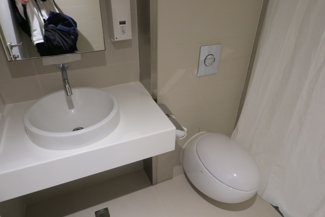 a sink and toilet in a bathroom