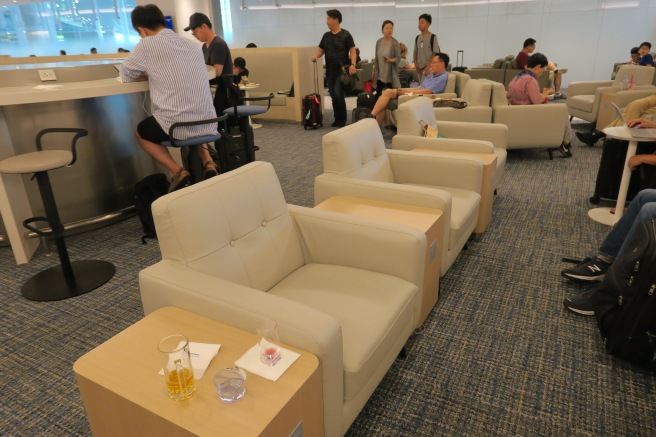 a group of people in a lounge