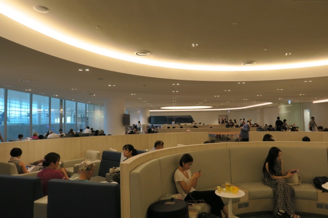 a group of people sitting in a restaurant