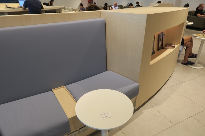 a table and bench in a restaurant