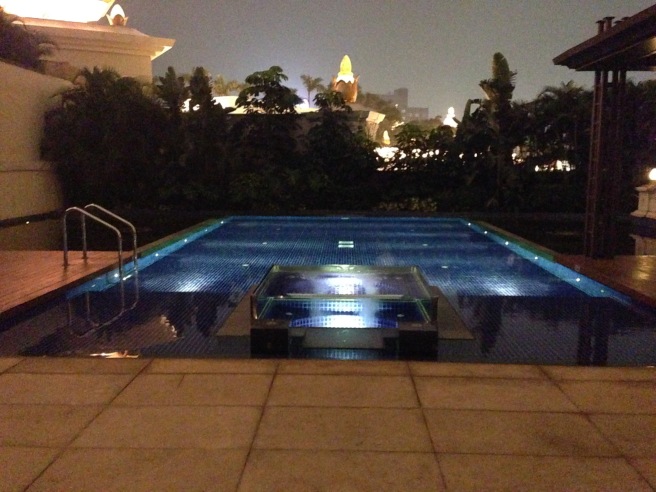 a pool with a ladder and steps